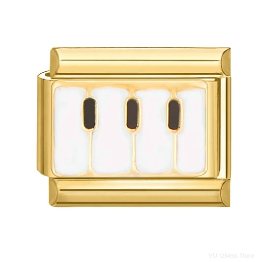 Charm Italiano de Teclas de Piano en Oro Blanco